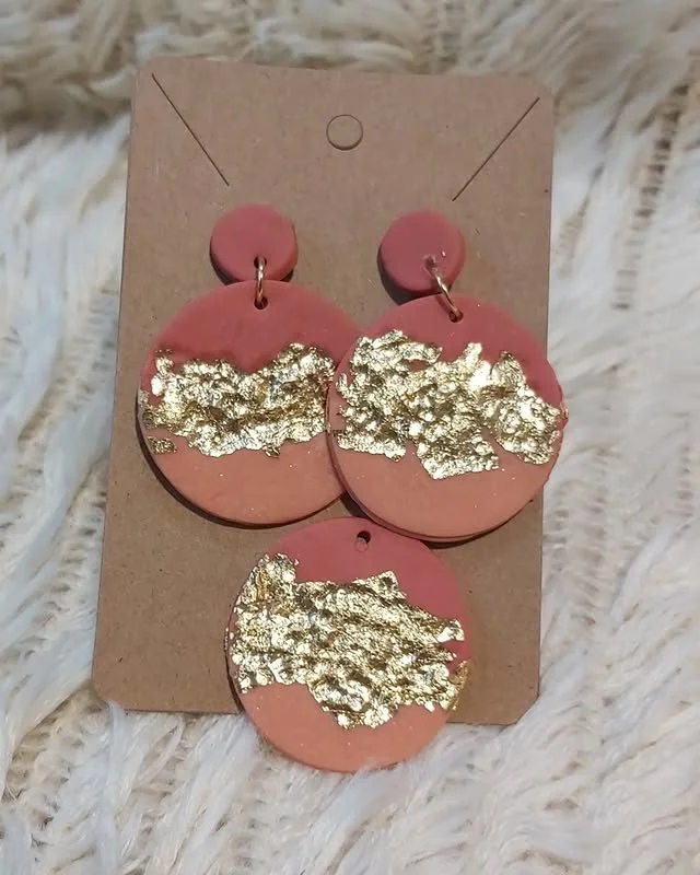 Dangle earrings with locket